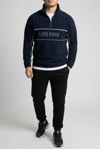 Pull polaire homme à liserés et inscription – Bleu marine