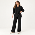 Ensemble maille côtelée à col polo et pantalon large — Noir — photo studio
