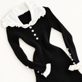 Robe côtelée à col blanc et poignets volantés — Noir — photo studio