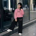 Ensemble fille à sweat imprimé et pantalon noir large