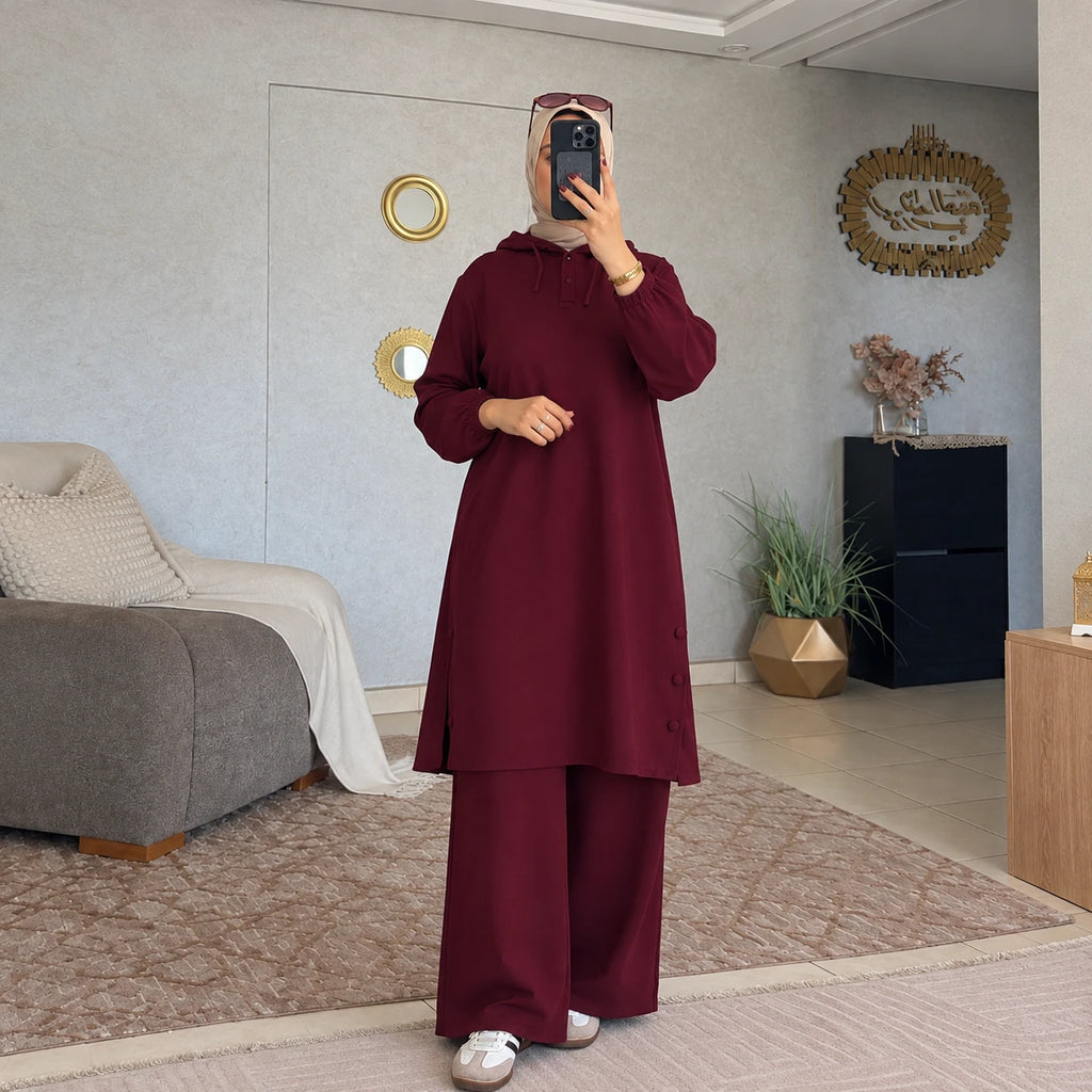 Ensemble femme à tunique longue à capuche et boutons latéraux
