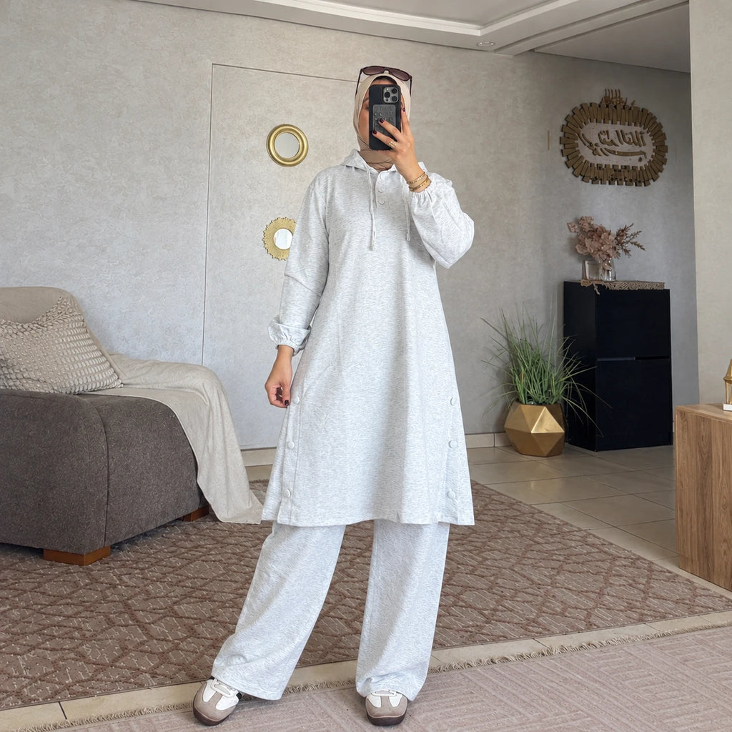 Ensemble femme à tunique longue à capuche et boutons latéraux