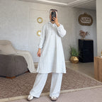 Ensemble femme à tunique longue à capuche et boutons latéraux