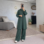 Ensemble femme à tunique longue à capuche et boutons latéraux
