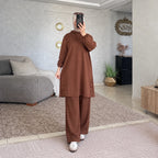 Ensemble femme à tunique longue à capuche et boutons latéraux