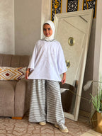 Ensemble fille à tunique volantée et pantalon à carreaux — Gris clair